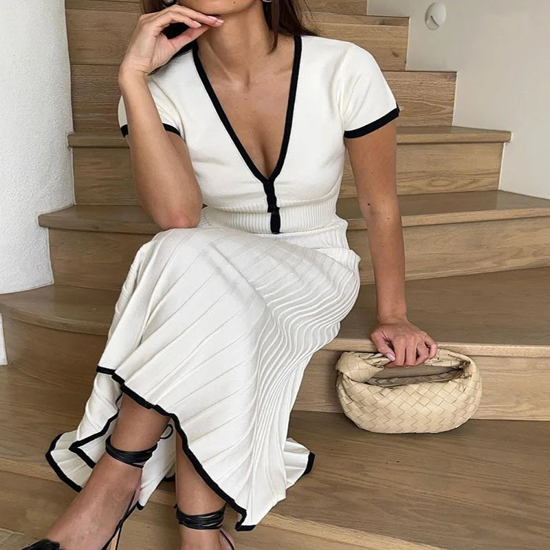 Elegant 2-Piece White Skirt Set – Crop Top & Pleated Midi Skirt